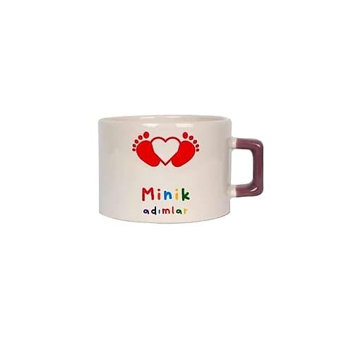 Beyaz promosyon Nescafe fincanı; pembe kulplu, bebek temalı renkli baskı